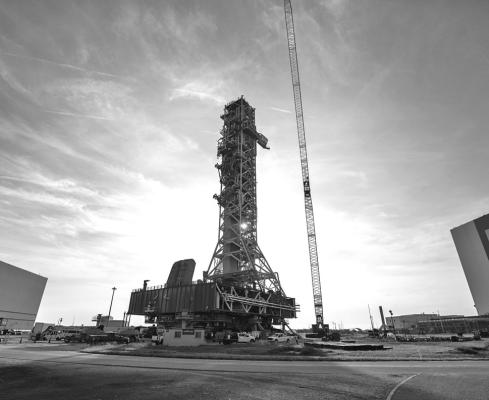 MOBILE LAUNCHER 1, carried by the crawler-transporter 2, rolls out from its park site location to Launch Pad 39-B at NASA’s Kennedy Space Center on Aug. 16, 2023. (Ben Smegelsky/NASA/TNS)