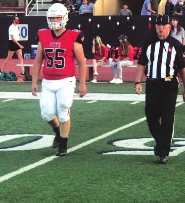 PONCA CITY’S HB Bowers (55) goes to the middle of the field for the Ponca City-Sand Springs coin toss. Bowers was the Wildcats’ game captain. Sand Springs won the district opener at Sullins Stadium Friday 35-10. (News Photo by David Miller)