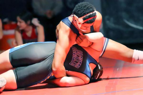 GABE ROLAND of Ponca City applies a hold on his Choctaw opponent during a dual Tuesday against Choctaw at Robson Field House. Roland won by a pin at 182 pounds. Choctaw won the dual 40-27. This photo was provided by Justin Boyer.