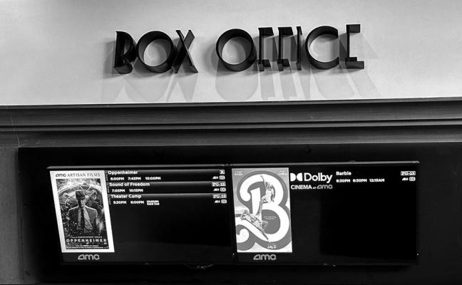 A MOVIE theater box office displays showtimes for “Oppenheimer” and “Barbie” in Los Angeles on July 20, 2023. (Valerie Macon/AFP via Getty Images/TNS)