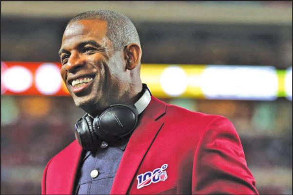 Deion Sanders of the NLF 100 All-Time Team is honored on the field prior to Super Bowl LIV between the San Francisco 49ers and the Kansas City Chiefs at Hard Rock Stadium on Feb. 2, 2020 in Miami, Florida. (Photo by Maddie Meyer/Getty Images/TNS)