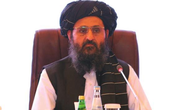 Photo on page 1 — The leader of the Taliban negotiating team Mullah Abdul Ghani Baradar looks on during the final declaration of the peace talks between the Afghan government and the Taliban is presented in Qatar’s capital Doha on July 18, 2021. (Karim Jaafar/AFP via Getty Images/TNS)