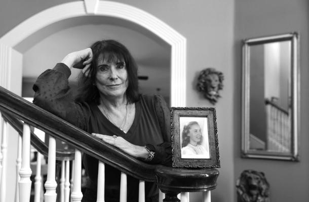 DR. TERRI Howard-Hughes poses with a photo of her mother, Angela J. Burke, on Sunday, Dec. 31, 2023, at their house in Plano, Texas. She sent her mother’s remains to space to honor her. (Shafkat Anowar/The Dallas Morning News/TNS)