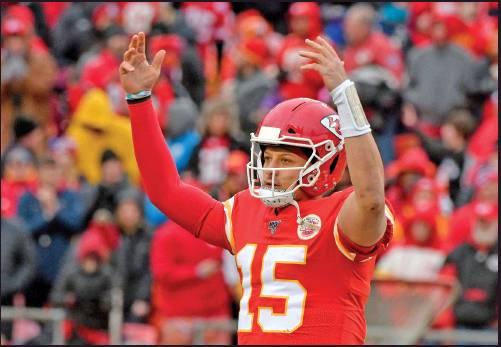 KANSAS CITY Chiefs quarterback Patrick Mahomes (15) celebrates following an NFL game against the Los Angeles Chargers in Kansas City, Mo., Sunday. The Chiefs won 31-21 and earned a first round bye in the NFL playoffs when Miami upset the New England Patriots. (AP Photo)