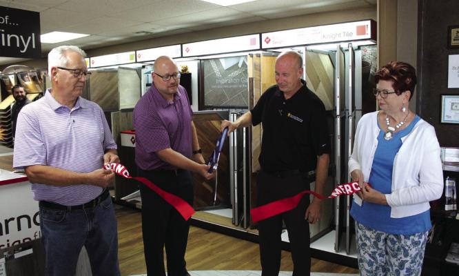 THE PONCA City Chamber of Commerce held a ribbon cutting was held for Anderson Flooring’s 20th anniversary on Tuesday, June 6 at 2 pm. Anderson Flooring is located at 509 N. 1st in Ponca City. From left to right: Tim Anderson, Matt Anderson, Brian Anderson, and Sharon Anderson. (Photo by Calley Lamar)
