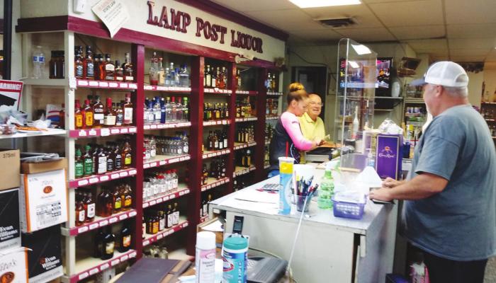 LAMP POST Liquor has been in business since 1962, the longest operating liquor store in Ponca City. Current and longtime owner, Stan Wheeler, would like the public to know they are still offering curbside and delivery services at this time. (News Photo by Jessica Windom)