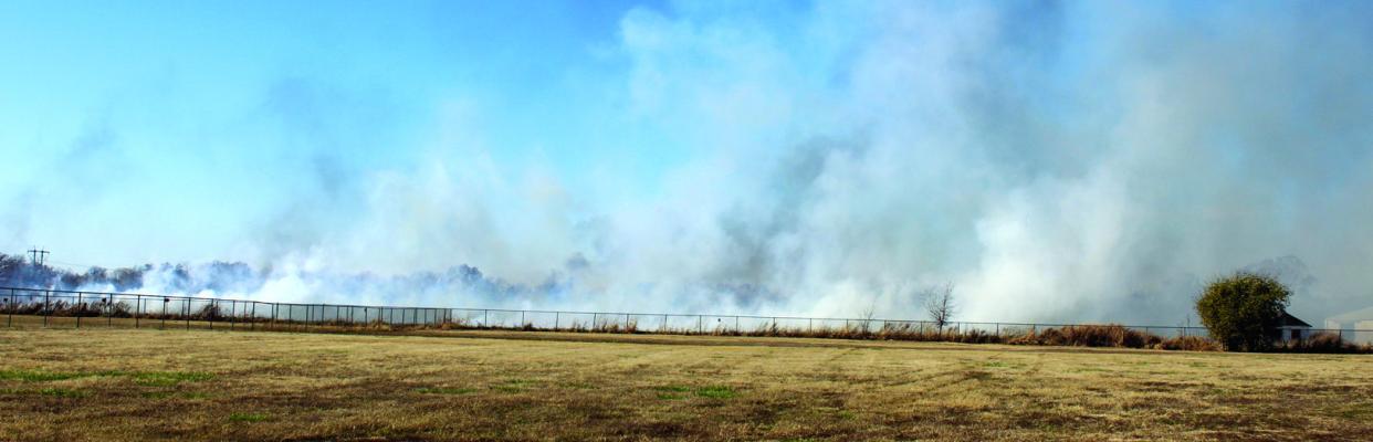 A GRASSFIRE occurred on Tuesday, Nov. 14 in a field near Harland’s Diesel around noon. The fire department fought the blaze for about an hour. In total, about 15 acres were burnt. The cause of the fire was attributed to a piece of equipment malfunction. (Photos by Calley Lamar)