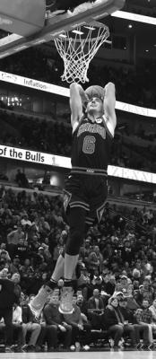 Bulls guard Alex Caruso (6) gets a breakaway dunk against the Hawks in the first half at the United Center in Chicago on Monday, Jan. 23, 2023. (Terrence Antonio James/Chicago Tribune/TNS)