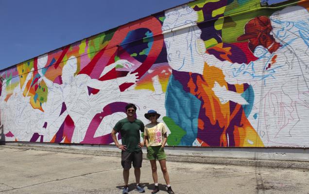 A ribbon cutting is scheduled for Tuesday, June 13 at 6 pm for the Unity Mural behind the Ponca City Chamber of Commerce building. The mural is being painted by artists Carlos Barboza and Virginia Sitzes (pictured). (Photo by Calley Lamar)