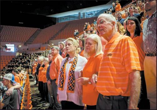 FANS AND STUDENTS sing the OSU Alma Mater at the end of the Celebration of Life event for T. Boone Pickens, Wednesday, Sept. 25, 2019 at Gallagher-Iba Arena in Stillwater, Okla.