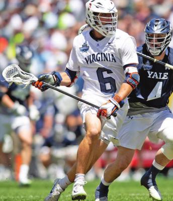 VIRGINIA’S DOX Dox Aitken (6) runs with the ball against Yale’s Jon Daniggelis (4) during the NCAA 2019 men’s Division 1 lacrosse championship in Philadelphia. The NCAA Division I Council is scheduled Monday to vote on providing another year of eligibility to spring sport athletes, such as baseball, softball and lacrosse players, who had their seasons wiped out by the coronavirus pandemic. (AP Photo)