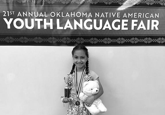 WOODLANDS ELEMENTARY first grader Charlotte Payne recently competed in the Oklahoma Native American Youth Language Fair in Norman. Charlotte won third place in the PreK-2nd grade Spoken Word Skit category. The name of her skit was “Munje Mitawe Ki,” which translates “My Bear.” Congratulations Charlotte! (Photo provided)