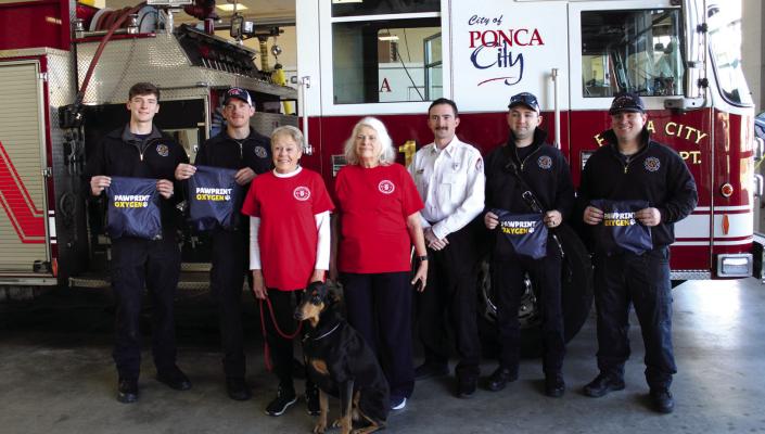 The Kay-9 Dog Training Club of Ponca City donated Pawprint Oxygen masks to the Ponca City Fire Department on Friday