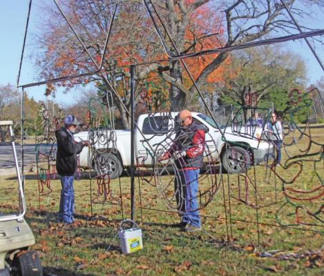 Volunteers are working and setting up over 300 Holiday Light Displays for the upcoming Festival of Angels light display show that is set to begin and is just around the corner on Wednesday, Nov. 25th at 6 p.m. at Lake Ponca Park.(News photo by Jessica Windom.)