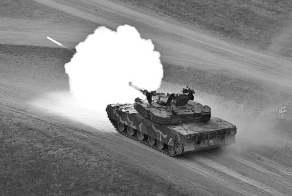 A South Korean K1A1 tank fires during a Warrior Shield live fire exercise at a military training field in Pocheon on March 22, 2023, as part of the Freedom Shield joint military exercise. (Jung Yeon-je/AFP/Getty Images/TNS)