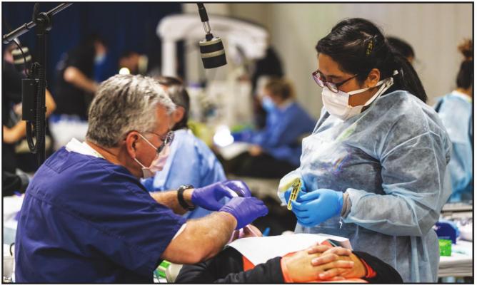 TWO PONCA CITY dentists participated in the 11th annual Oklahoma Mission of Mercy event in Still-water.