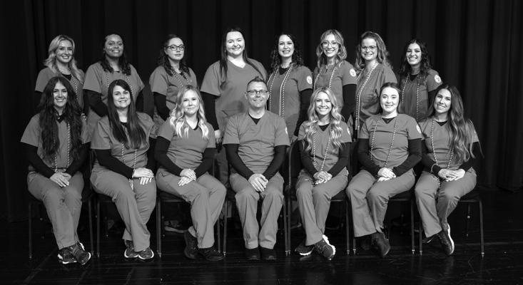 NOC NURSING Graduates 2023. Front Row (L-R): Harley Waldrep, Haylee Rogers, Kylee Pameticky, Michael A. Ward, Ava Franks, Emily Smith, and Trista Kilian. Back Row (L-R): Ashley Wellings, Janeka Perry, Kristen Leading Fox, Courtney Covert, Lauren Cook, Mikaela Browning, Patricia Frickenschmidt, and Caitlin Nagel (photo by Shiloh Martin/Northern Oklahoma College).