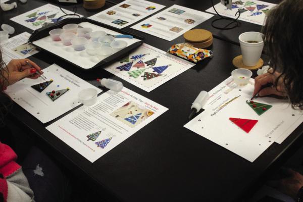 THE PIONEER Woman Museum held an interactive glass fusing class for adults on Saturday, Nov. 18 from 11 am to 1 pm. Attendees were instructed by Audrey Schmitz on the art of fused glass, and used that information to fashion holiday ornaments. (Photo by Calley Lamar)