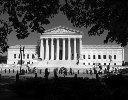 People visit the front of the U.S. Supreme Court Building on Apr. 19, 2023, in Washington, DC. (Anna Moneymaker/Getty Images/TNS)