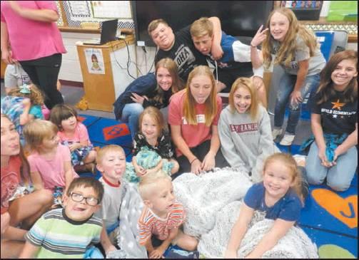 BLANKETS WERE presented to the Washington Prekindergarten Center from the East Middle School Student Council.