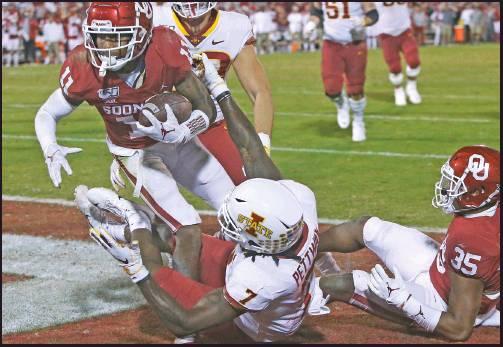 OKLAHOMA CORNERBACK Parnell Motley (11) intercepts a pass intended for Iowa State wide receiver La’Michael Pettway (7) on a 2-point conversion attempt late in a game Saturday in Norman. The Sooners won 42-41. (AP Photo)