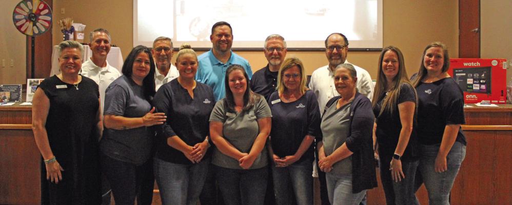 A CHAMBER of Commerce Business After Hours event was hosted by the Cherokee Strip Credit Union on Thursday, June 29 at the Carolyn Renfro Event Center from 5 pm to 7 pm. A raffle for door prizes was held during the event. Pictured are members of Cherokee Strip Credit Union. (Photo by Calley Lamar)