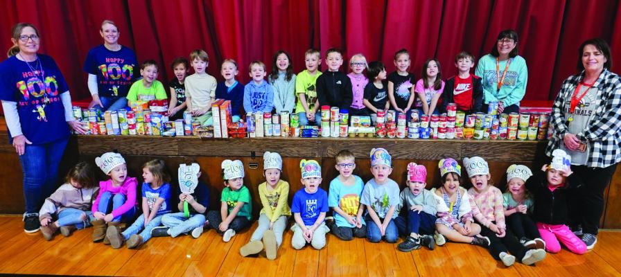 100TH DAY OF SCHOOL — On Thursday, February 1, First Lutheran School four-year-olds to first grade celebrated the 100th day of school by collecting over 100 (174) cans of food for the church food bank. (Photo provided)