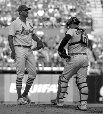 ST. LOUIS Cardinals pitcher Adam Wainwright talks with catcher Willson Contreras (40) during the second inning against the Houston Astros at Busch Stadium on Thursday, June 29, 2023, in St. Louis. (Scott Kane/Getty Images/TNS)