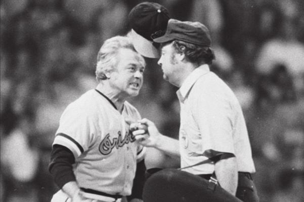 EARL WEAVER, longtime manager of the Baltimore Orioles, is shown disputing an umpire’s call. He had a reputation for hating umpires, but he treated Emmett Ashford with respect.
