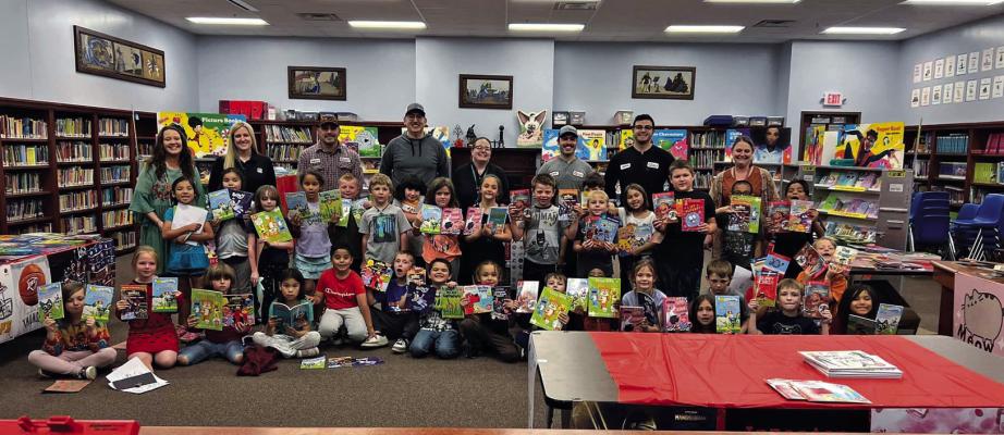 THE FIRST graders at Garfield Elementary were treated to a book fair on May 3. Each student got to pick out two books. A special thank you to Garfield’s Partner in Education, Phillips 66. We appreciate your support for helping the students learn to read! Photo provided.