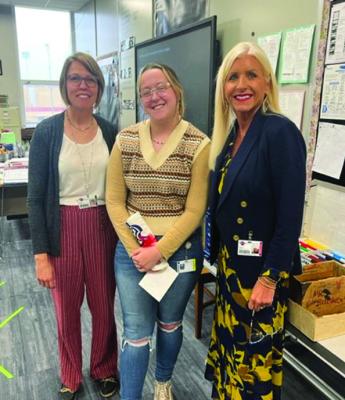 Jill Klein (Po-Hi math instructor), Rileyann Lawson (Wildcat of the Week) and Shelley Arrott (PCPS Superintendent)