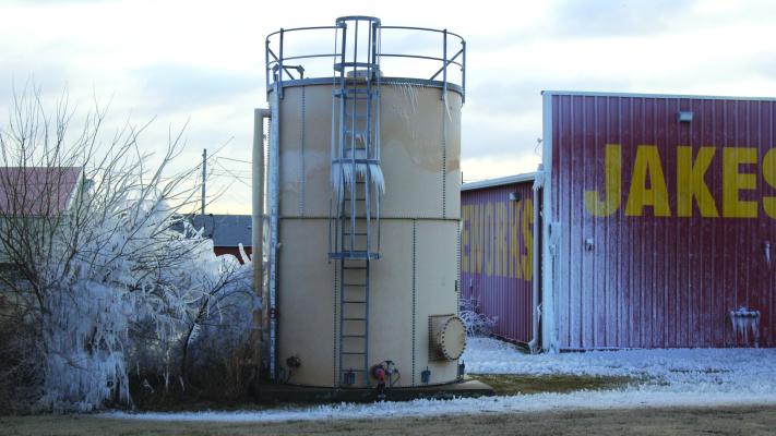 A WATER tower burst open during the morning on Friday, Jan. 12 near Jake’s Fireworks on Hubbard Road. Due to frigid temperatures, the water quickly froze leaving icicles hanging off the structure, and the surrounding ground and building covered in a layer of ice. (Photo by Calley Lamar)