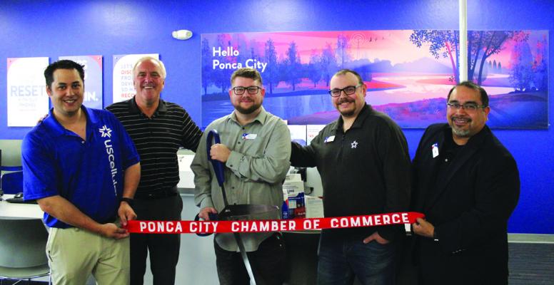 A RIBBON cutting was held on Friday, May 5 for US Cellular, located at 2412 N. 14th. Pictured from left to right: Lee Green, Dave Ryan, Nico Berry, Trey Fox, and Joe Cabrera. (Photo by Calley Lamar)