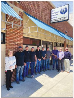 Enjoying a bit of shade from the new awnings, left to right: NERA Board Chair Erin Liberton of Phillips 66; Bill Powell, Matt McKinney, Cole Butler, and Jaycob McKinney of Powell Electric; Ronnie Carter, Tracy Rinehart, and Mitch Garrity of Mitchco Fabrication; Larry Love of Centerline Inc; and Mark Love of Cherokee Strip Credit Union.