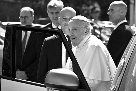 POPE FRANCIS exits his car while arriving at The Vatican’s Porta del Perugino gate on June 16, 2023, after being discharged from the Gemelli hospital in Rome, where he underwent abdominal surgery last week. (Filippo Monteforte/AFP/ Getty Images/TNS)