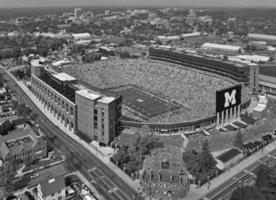 MICHIGAN STADIUM, on the UM campus in Ann Arbor, is the largest facility for college football in the U.S. with a seating capacity of more than 107,000. The largest crowd in the facility’s history apparently came to watch an ice hockey match between Michigan and Michigan State.