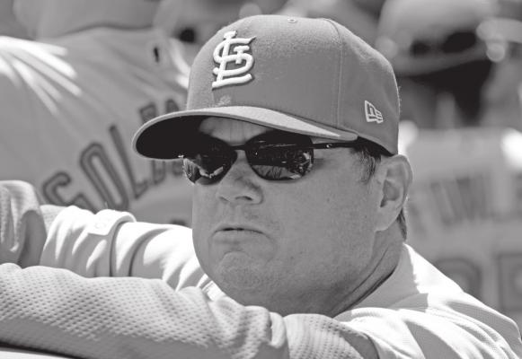 ST. LOUIS Cardinals manager Mike Shildt looks out of the dugout before a 2019 baseball game against the Pittsburgh Pirates in Pittsburgh. The Cardinal return largely intact after battling the Cubs for the NL Central, then advancing to the NLCS, where they lost to the Nationals in four games. (AP Photo)