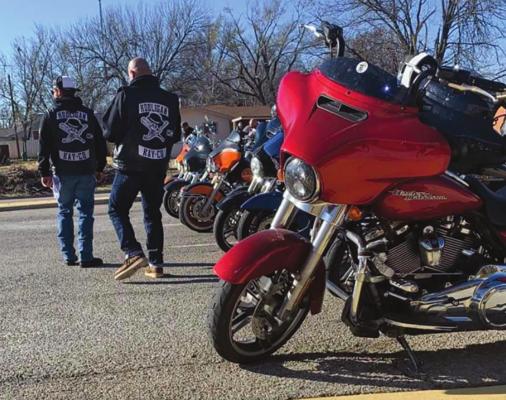 Local Motorcycle Club, the Hooligans Kay County Chapter, held their third annual Holiday Run over the weekend and were able to pick angels off the Angel Tree at Walmart and buy gifts for 16 children so they are able to have a Christmas this year.(News photos provided by Alan Jones.)