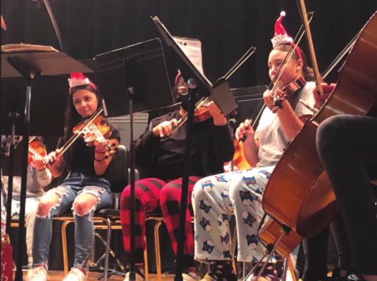 EMS Orchestra performs for students