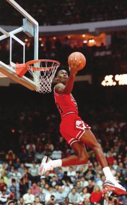 IN THIS FEB. 6, 1988, file photo, Chicago Bulls’ Michael Jordan dunks during the slam-dunk competition of the NBA All-Star weekend in Chicago. Jordan left the old Chicago Stadium that night with the trophy. To this day, many believe Wilkins was the rightful winner. (AP Photo)