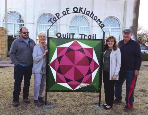 From the left, Richard Braden, Diane Braden, Cindy Oard, and Jim Braden. Richard Braden, Diane’s son, made the Top of Oklahoma Quilt Trail frame located at the Top of Oklahoma Museum in Blackwell. Photo submitted by Cindy Oard.