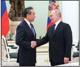 Russian President Vladimir Putin meets with China’s Director of the Office of the Central Foreign Affairs Commission Wang Yi at the Kremlin in Moscow on Feb. 22, 2023. (Anton Novoderezhkin/SPUTNIK/AFP via Getty Images/TNS)