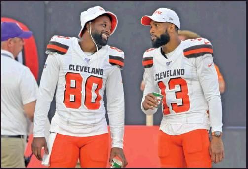 CLEVELAND BROWNS wide receivers Jarvis Landry (80) and Odell Beckham Jr. (13) talk on the sideline during an NFL preseason game against the Washington Redskins Aug. 8 in Cleveland. The expansion era has been tortuous, two embarrassing decades of despair and dysfunction. Well, those painful days appear to be ending. (AP Photo)