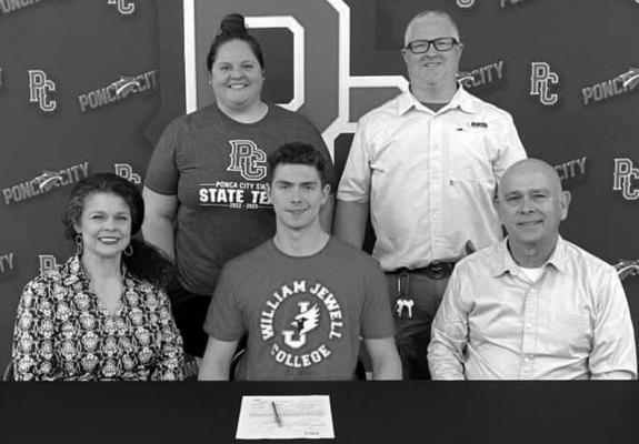 TIMOTHY CRANK of Ponca City Tuesday signed a letter of intent to swim at William Jewell College in Liberty, Mo. Among those at the signing were, front row from left, Timilyn Crank, mother; Timothy Crank; Steve Crank, father; back row, Heather Harris, Po-Hi head swimming coach and Derek Taylor, assistant coach. (Photo provided)
