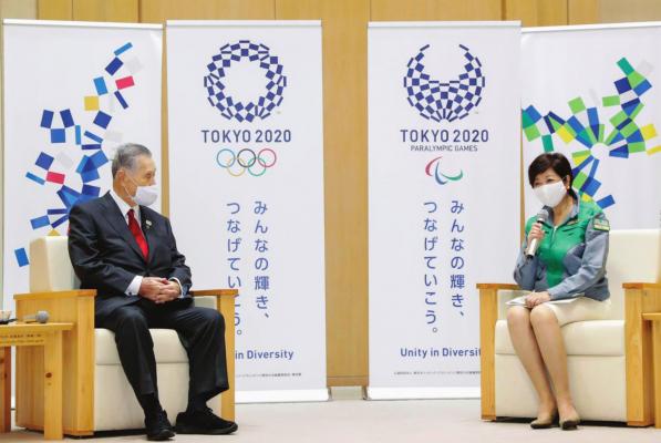 TOKYO’S NEWLY reelected Gov. Yuriko Koike, right, meets Tokyo 2020 President Yoshiro Mori at Tokyo Metropolitan Government headquarters in Tokyo Monday, July 6, 2020. Koike assured Mori that she plans to continue working with him on achieving the games, and agreed to his proposal to set up a meeting among officials from the government, Tokyo and Olympic organizers to discuss COVID-19 countermeasures. (Kyodo News via AP)