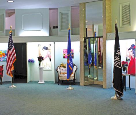 The Ponca City High Art gallery now featuring flags from Veteran’s Landing. (Photo by Calley Lamar) School Junior/Senior Prom to help