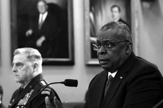 (L-R) Chairman of the Joint Chiefs of Staff General Mark Milley and U.S. Secretary of Defense Lloyd Austin testify during a House Appropriations Defense Subcommittee hearing on Capitol Hill March 23, 2023, in Washington, DC. The military leaders testified about the Department of Defenses fiscal year 2024 budget request. (Drew Angerer/Getty Images/TNS)