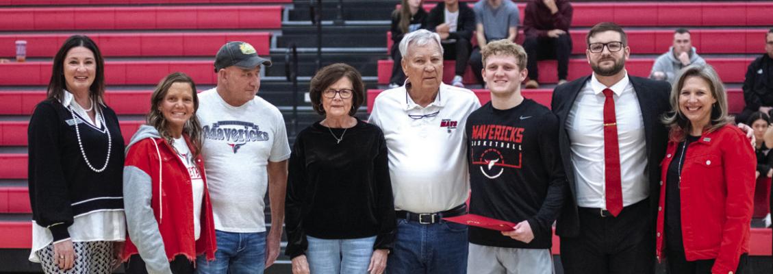 TYLER DAY received the Jared Weiberg Endowed Memorial Scholarship at NOC’s game against NOC Enid Monday night. Pictured (L-R): NOC Vice President for Community Relations &amp; Development Sheri Snyder, Becky Day, Robert Day, Vina Weiberg, Mick Weiberg, Tyler Day, coach Brandon Gossett, NOC Interim President Diana Watkins. (photo by Shiloh Martin/Northern Oklahoma College)
