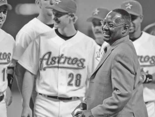 FORMER HOUSTON Astro Jimmy Wynn is joined by current players as he prepares to throw out the ceremonial first pitch in a 2005 game in Houston. Wynn, the slugger who earned his nickname of “The Toy Cannon” during his days with the Astros in the 1960s and ‘p--70s, has died. Wynn was 78. The Astros said he died Thursday in Housto. (AP Photo)