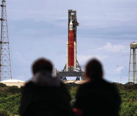 Visitors to the Launch Complex 39 Observation Gantry at Kennedy Space Center, Fla. get a good view of Artemis I, NASA s Space Launch System heavy-lift rocket carrying the Orion spacecraft, as it sits at Launch Pad 39-B on Sunday, August 28, 2022.